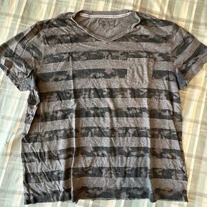 Men’s express tshirt. Size xxl but shrunk so it fits like and xl